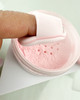 Close-up view of the soft, latex-free sponge material of the mini air cushion powder puff.
