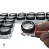 Hand holding a Square Thick Wall Cosmetic Jars with Black Trim Acrylic Window Cap 