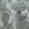 Cosmetic container lids in clear for 10 gram beauty container eye shadow pots.